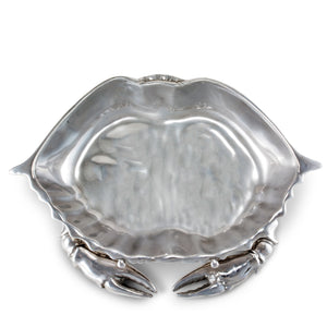 Viewed from above, this decorative bowl shaped like a crab adds a unique touch to coastal decor.