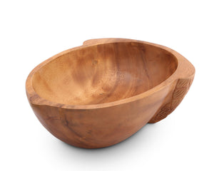 Handcrafted wooden salad bowl with intricate detailing on the side, viewed at an angle, ideal for kitchen decor.