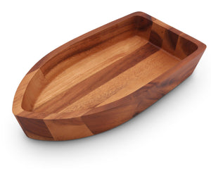 This wooden salad bowl, viewed from a side angle, showcases artisanal craftsmanship and luxury home accessory design.