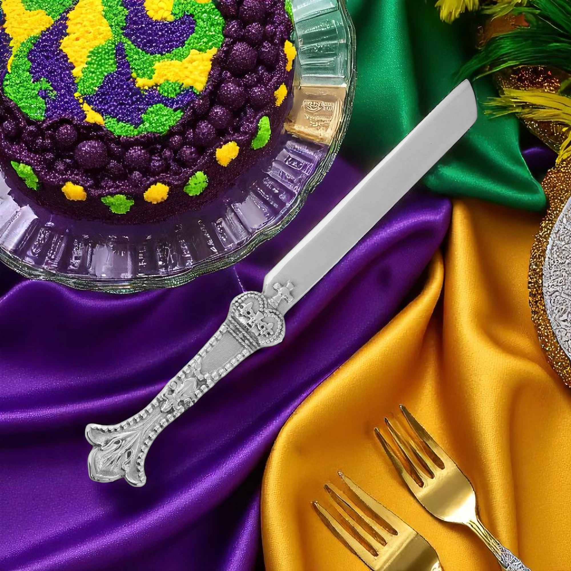 Elegant cake knife with ornate handle detailing, viewed from an angled perspective, highlighting its artisanal craftsmanship.