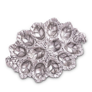 Elegant deviled egg holder with leaf pattern seen from above, perfect as a designer tableware piece.