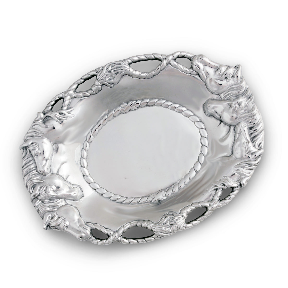 Angled view of a silver equestrian-themed decorative bowl featuring detailed horse head accents and braided edges