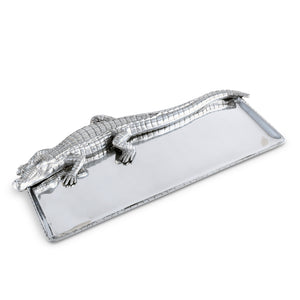 A unique tray with a crocodile design viewed at an angle, ideal for luxury home accessory enthusiasts.