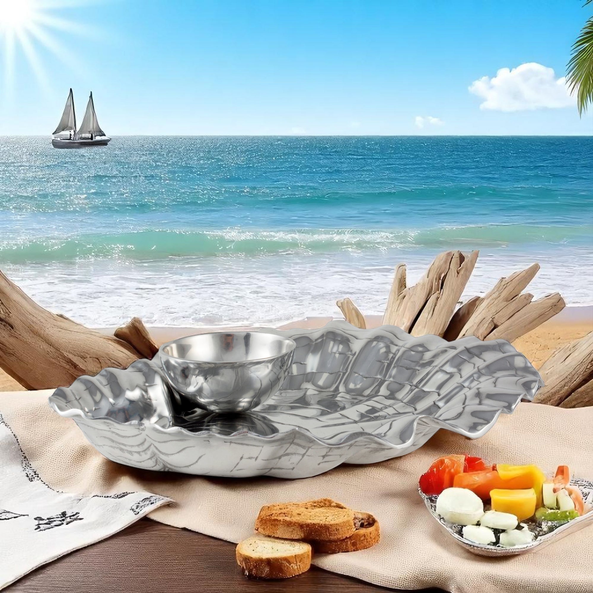 A modern chip dip set with a shiny finish is captured from above, showcasing its elegant craftsmanship and coastal decor appeal.