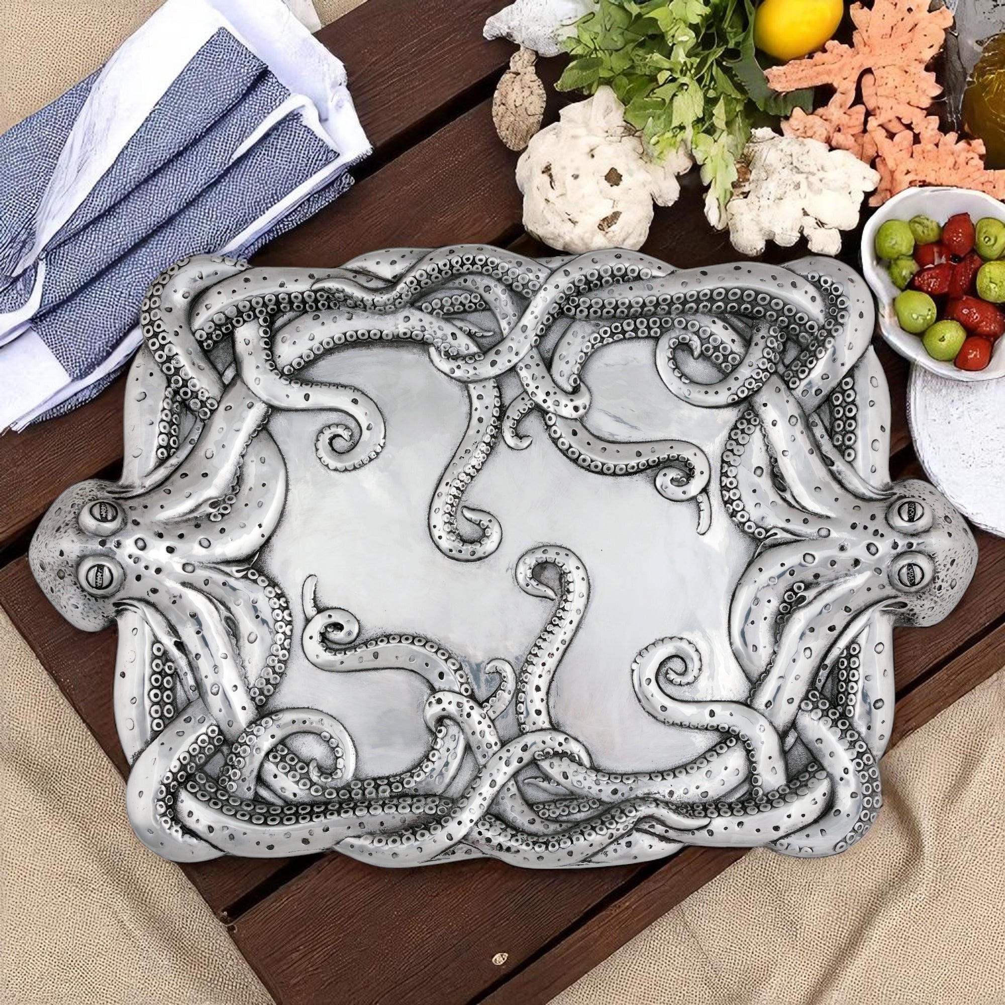 Artistic tray with intricate octopus design, viewed from a slight angle, showcases artisanal craftsmanship and luxury home accessory appeal.