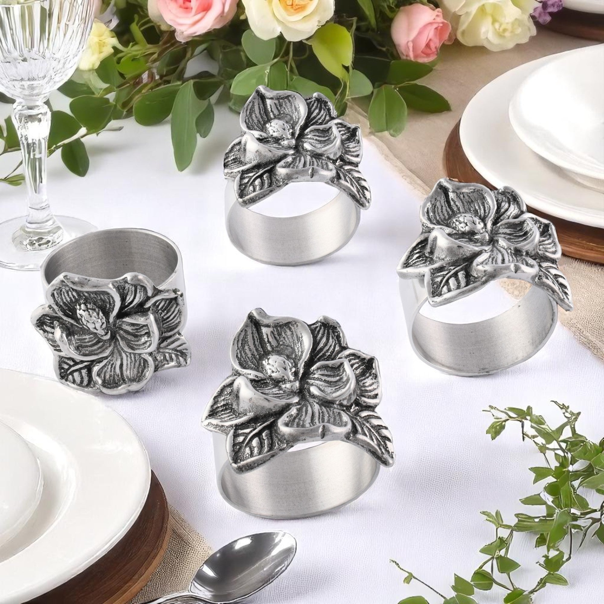 Ornate flower napkin rings in a perspective view, showcasing artisanal craftsmanship and elegance for a designer table setting.