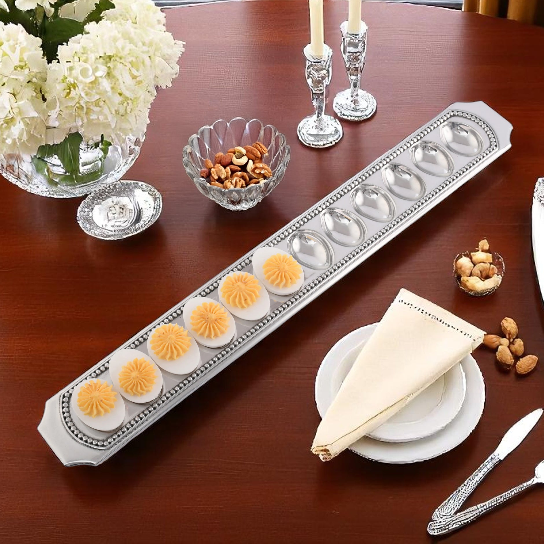 Elegant deviled egg holder viewed from an angle, showcasing its sleek design and perfect for entertaining essentials.