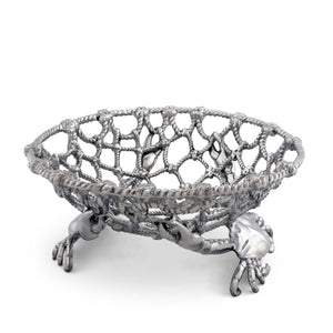 Seen from the side, the decorative bowl features intricate crab designs and open lacework, ideal for coastal decor.