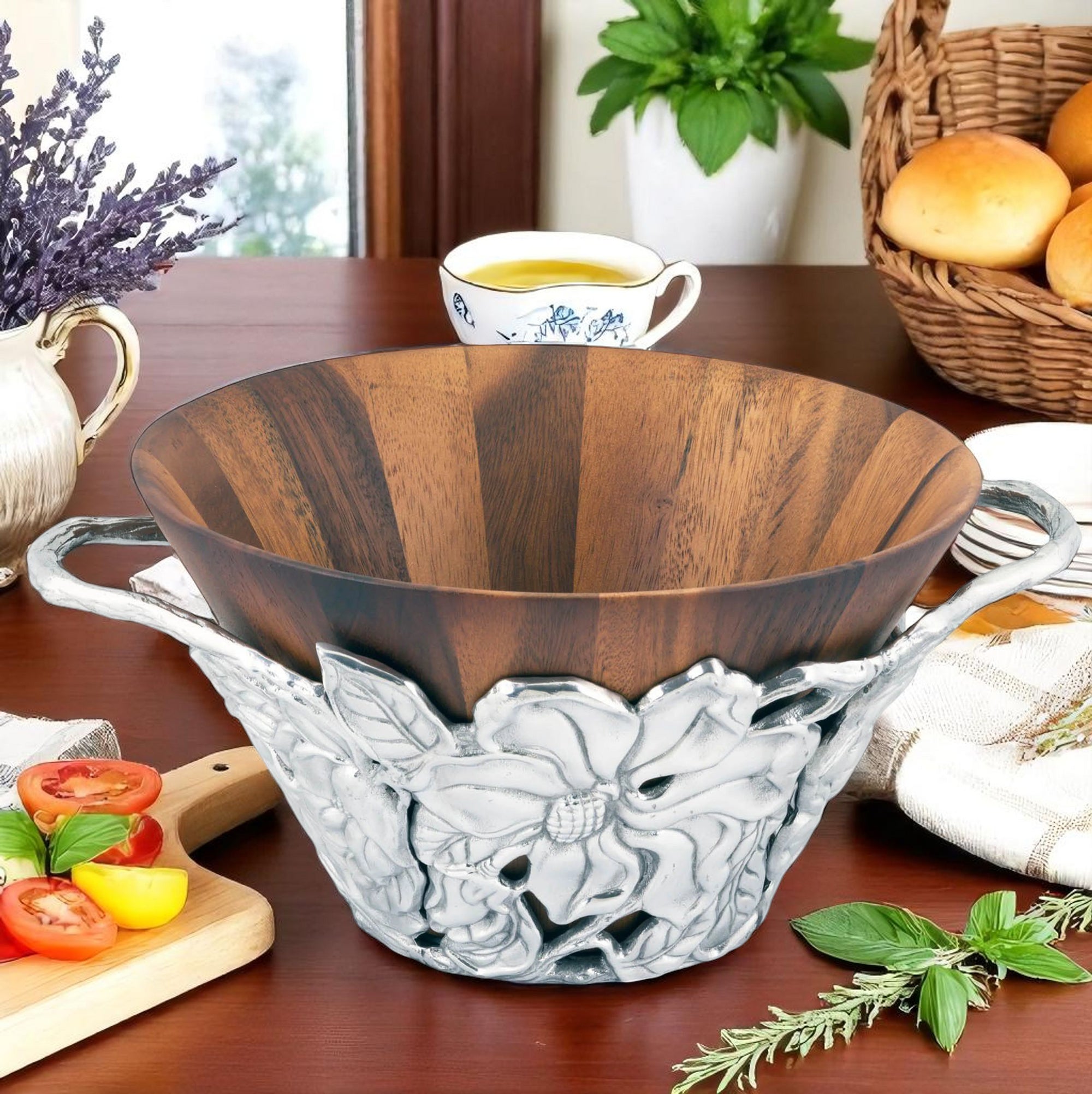 Artisanal salad bowl with floral metalwork, viewed from a side angle, highlights luxury home accessory details.