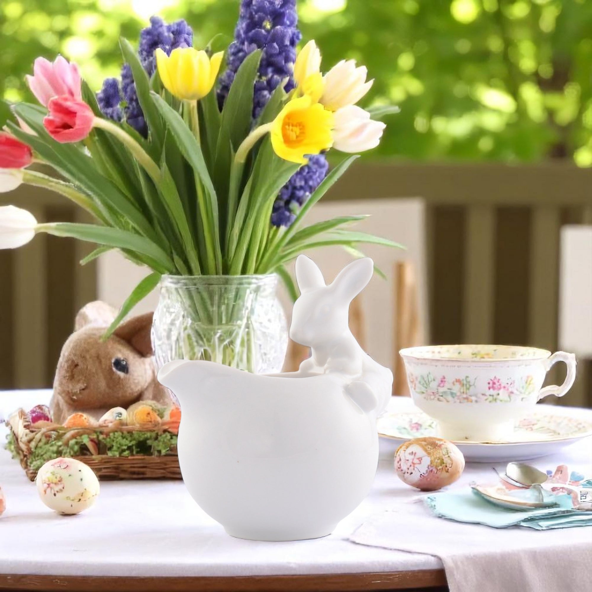 Charming creamer with a playful rabbit design viewed from an angled side, perfect for modern classic table settings.