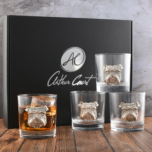 Arthur Court bar glasses with bulldog motifs, viewed at an angle to showcase their unique design, perfect for cocktail accessories and luxury home decor.
