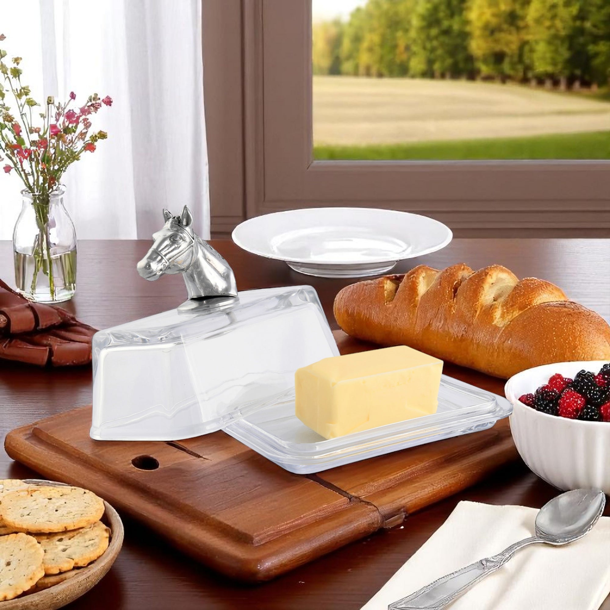 A luxury horse-themed butter dish viewed from an angle, showcasing artisanal craftsmanship and modern classic design.