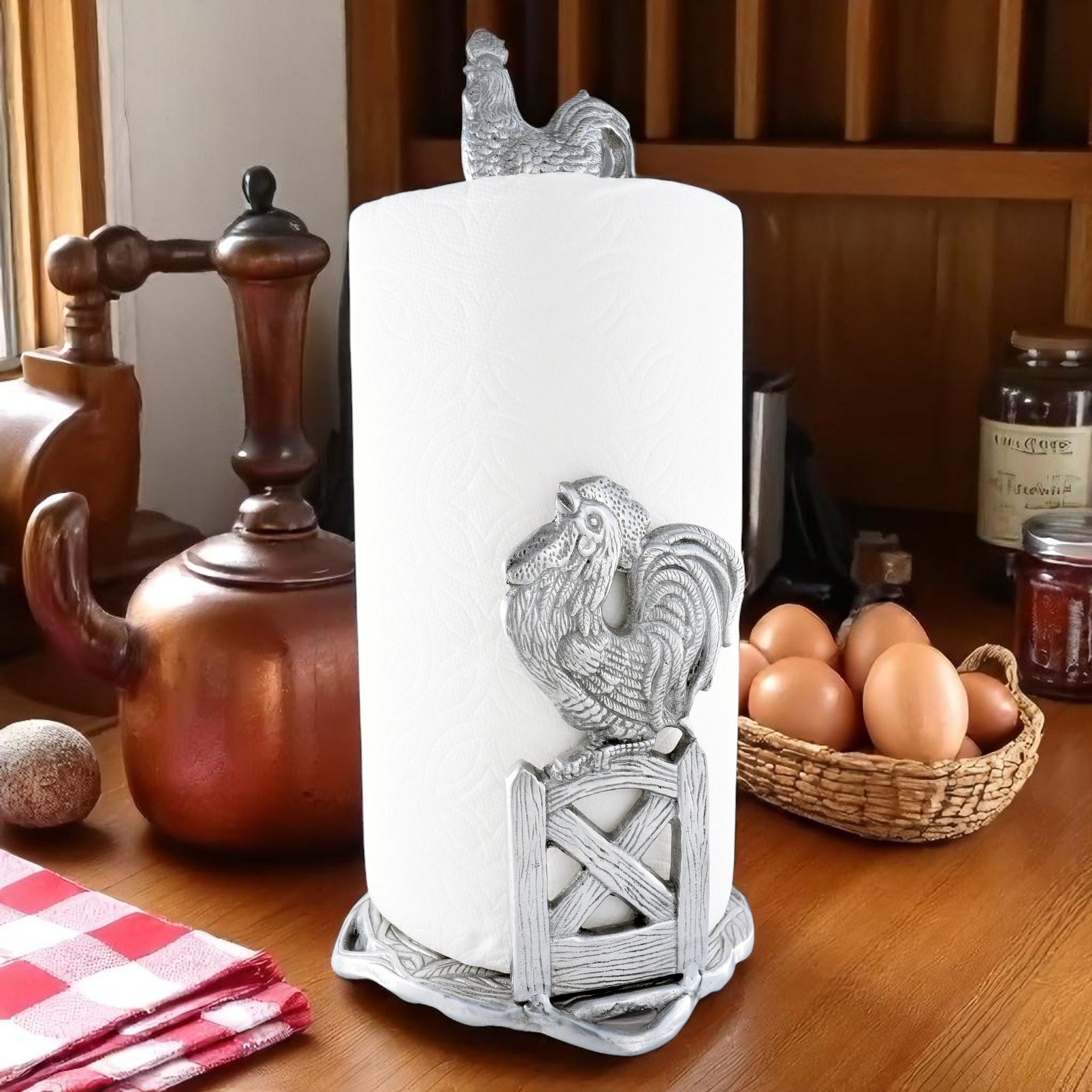 Rooster-themed paper towel holder with ornate silver details, viewed slightly from above, perfect for kitchen decor enthusiasts