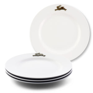 A set of dinner plates featuring a charming rabbit design, viewed at a slight angle to showcase artisanal craftsmanship.