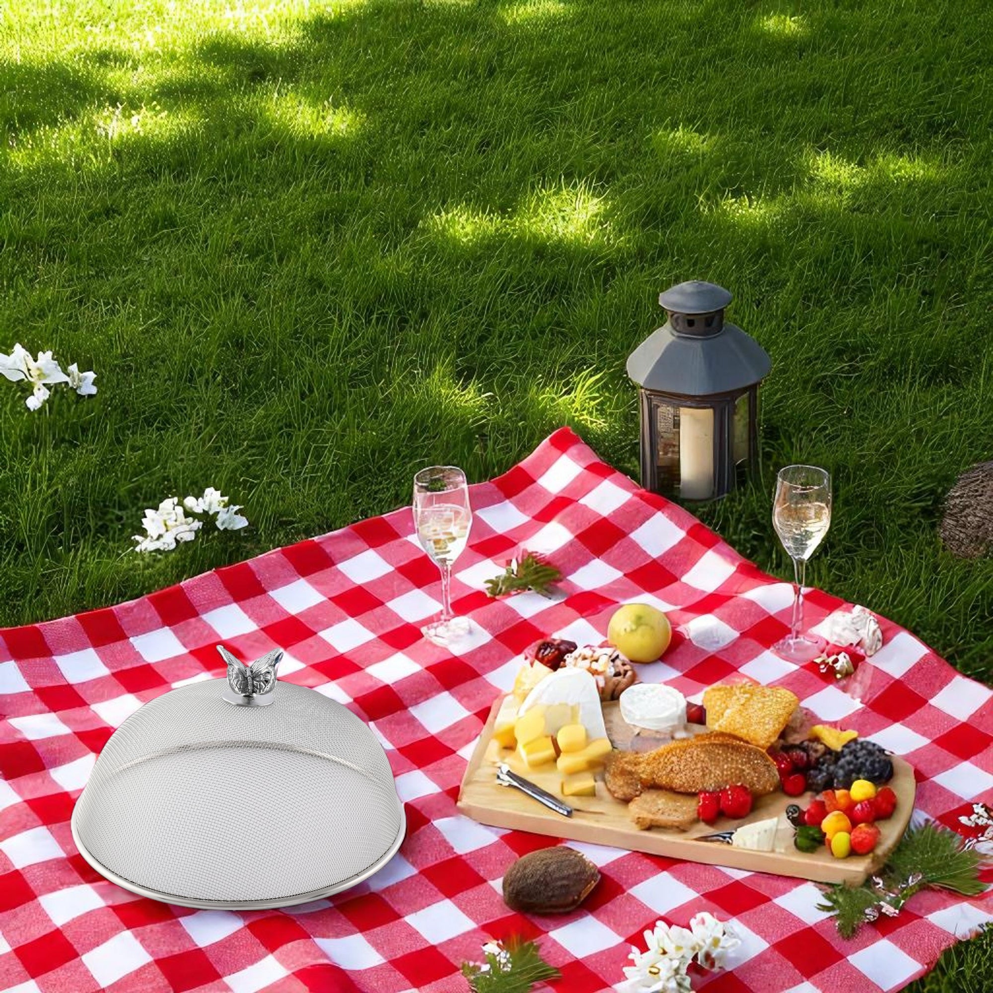 Picnic cover with a butterfly handle, viewed from a slight angle, showcasing its elegant mesh design for entertaining essentials.