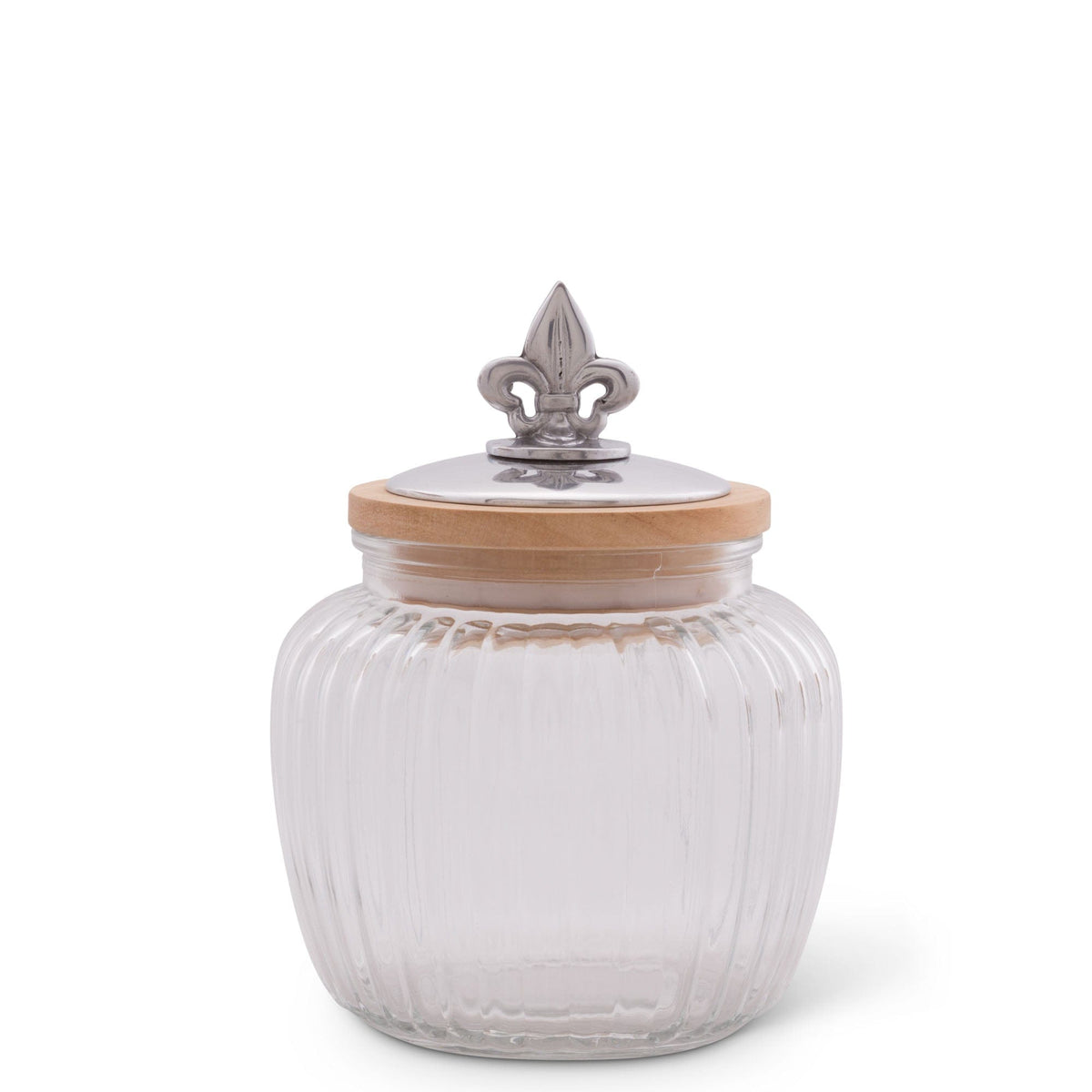This elegant canister with a fleur-de-lis lid is viewed from the side, showcasing its ribbed glass design as a luxury home accessory.