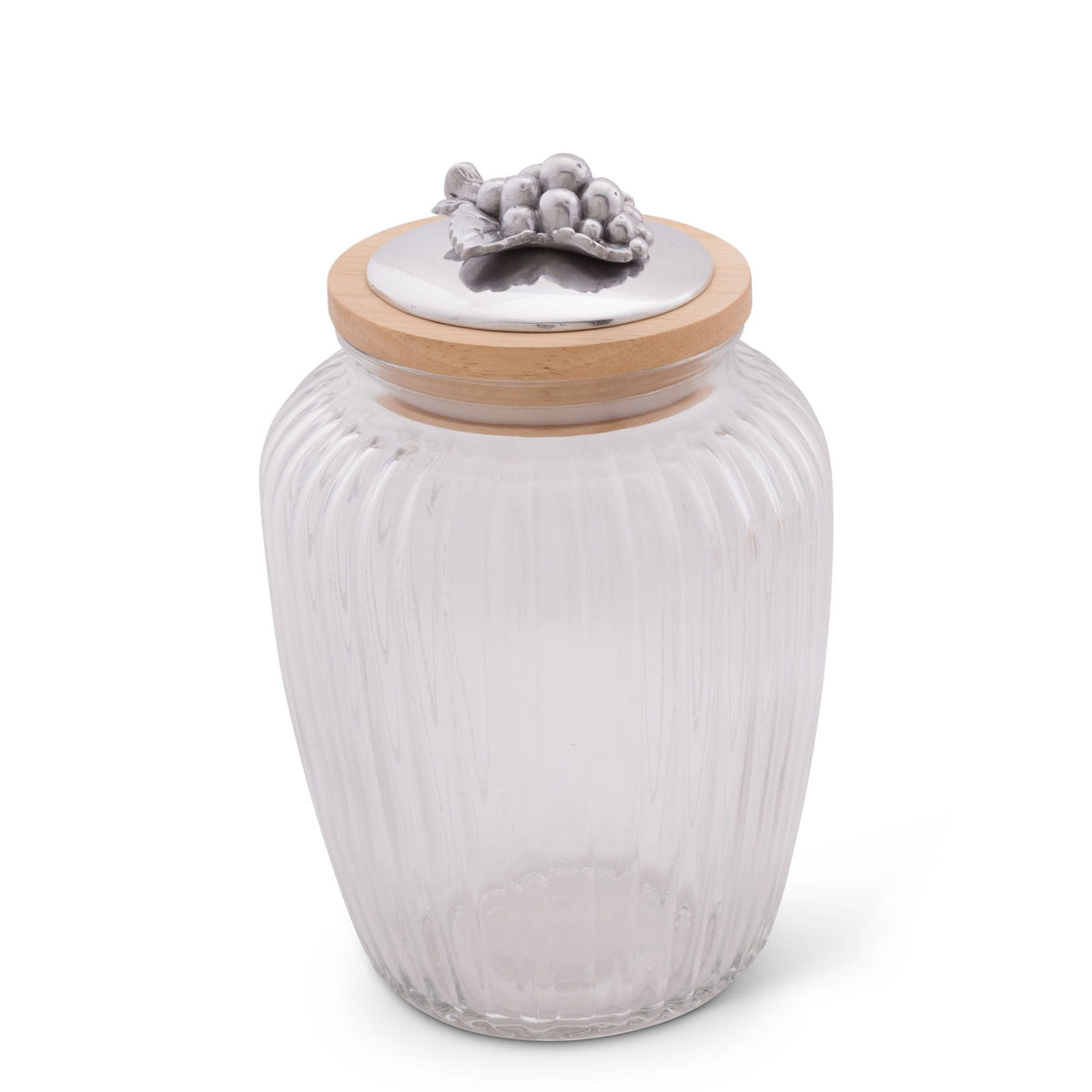 Seen from a slightly elevated angle, this ribbed glass canister features a wooden lid with an elegant grape motif, perfect for a modern classic kitchen decor.
