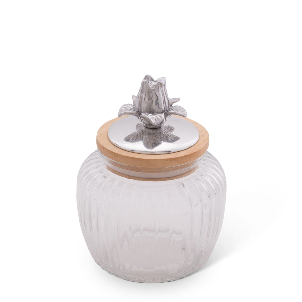 Seen from a slightly elevated angle, this elegant canister features a ribbed glass design with a decorative metal floral lid.