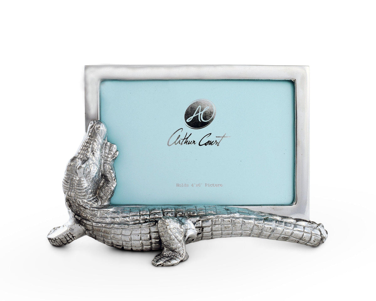 Elegant photo frame featuring a detailed crocodile design on the side, angled in a close-up shot against a white background, ideal for decorative photo display.