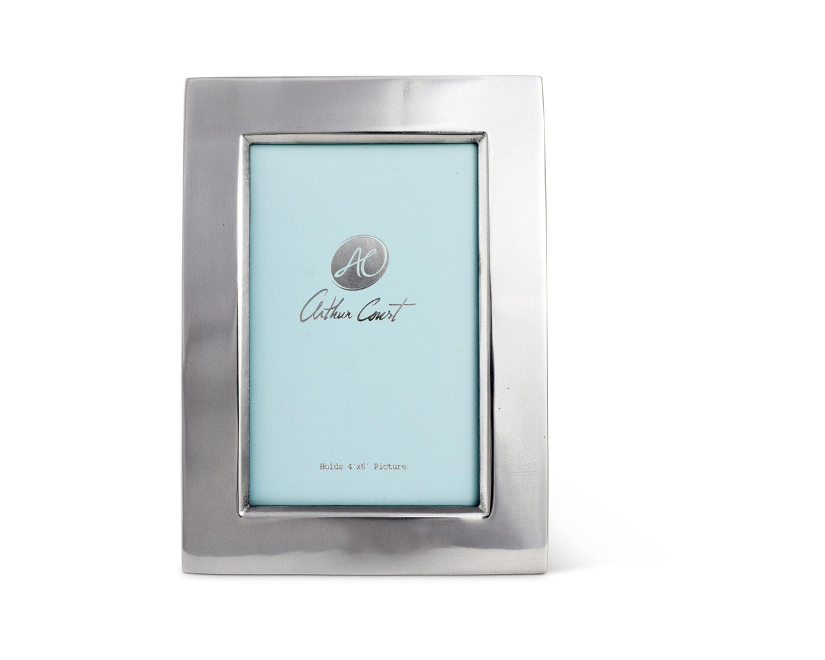 The Arthur Court photo frame, with a sleek silver finish, is viewed from the front, highlighting its modern classic design.