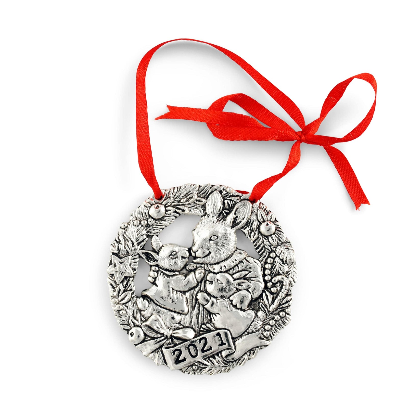 Seen from above, a 2021 decorative ornament with intricate rabbit design and red ribbon, perfect for seasonal decor.