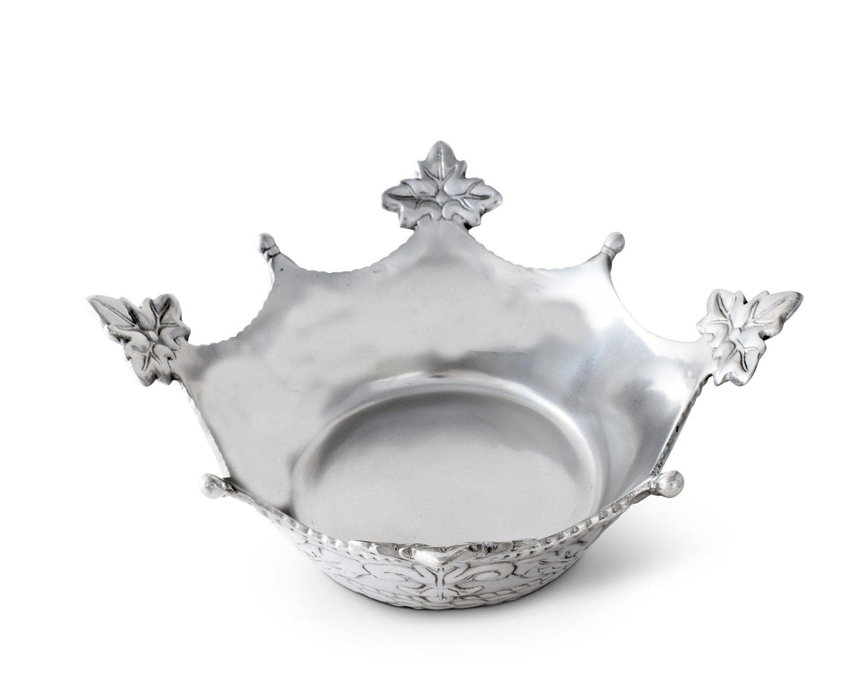 An elevated view showcases a decorative serving bowl with ornate leaf details, ideal for luxury home decor.