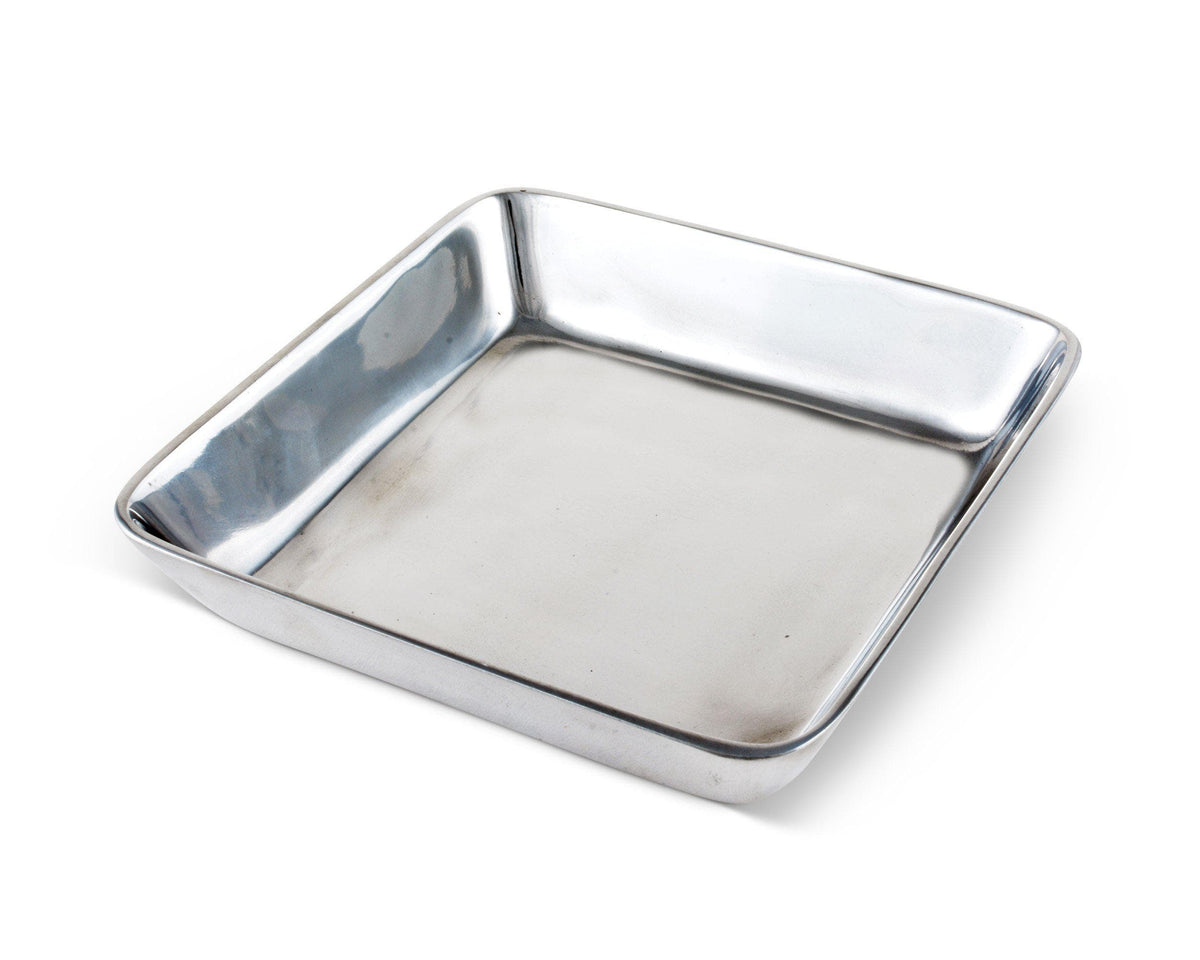 Sleek napkin holder with a reflective silver finish, viewed from a slight angle, ideal as an elegant table setting accent.