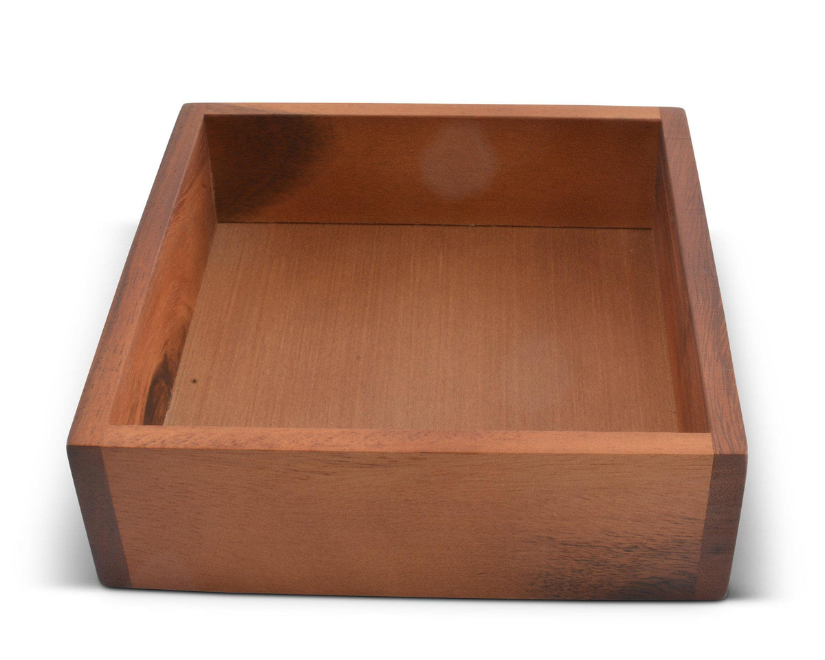 Wooden napkin holder in a close-up shot, showcasing artisanal craftsmanship as a modern classic kitchen decor.