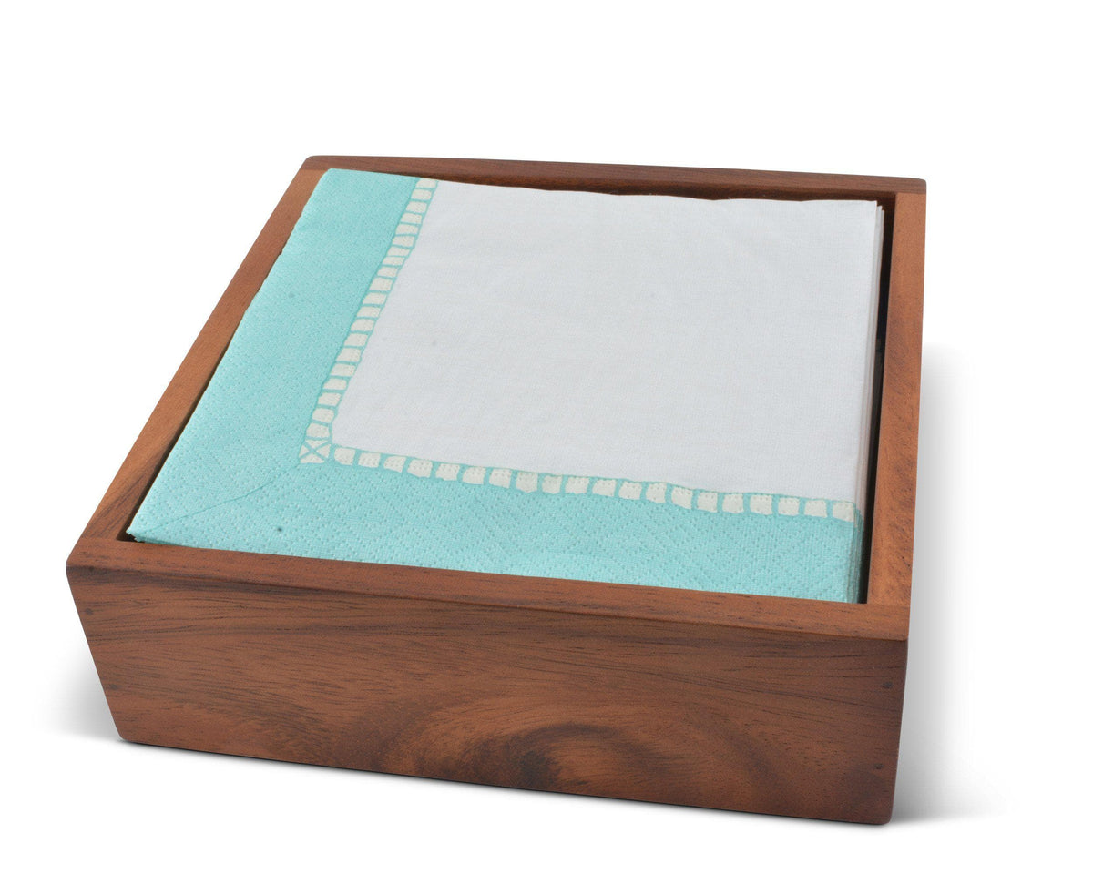 Walnut napkin holder viewed from a slight angle, showcasing white and aqua napkins, ideal for modern classic decor.