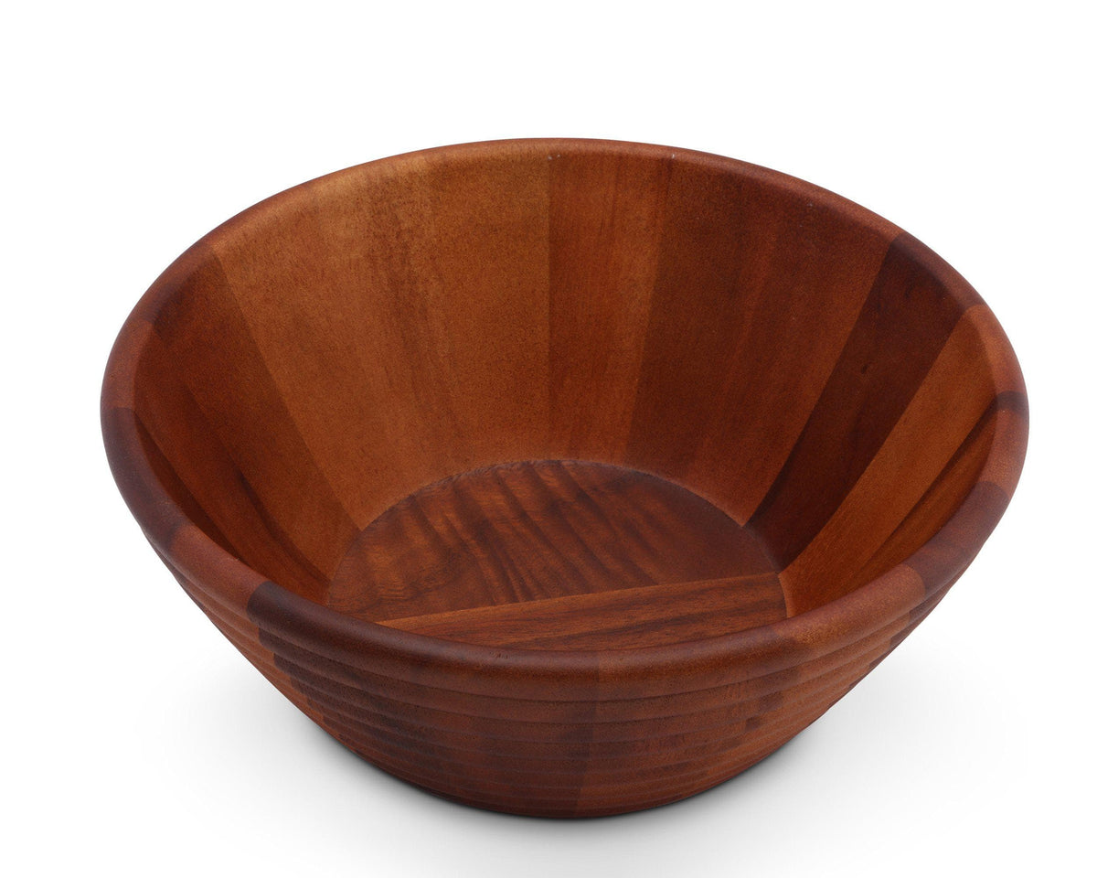 A wooden salad bowl with rich grain patterns is captured in a side angle, showcasing its artisanal craftsmanship.