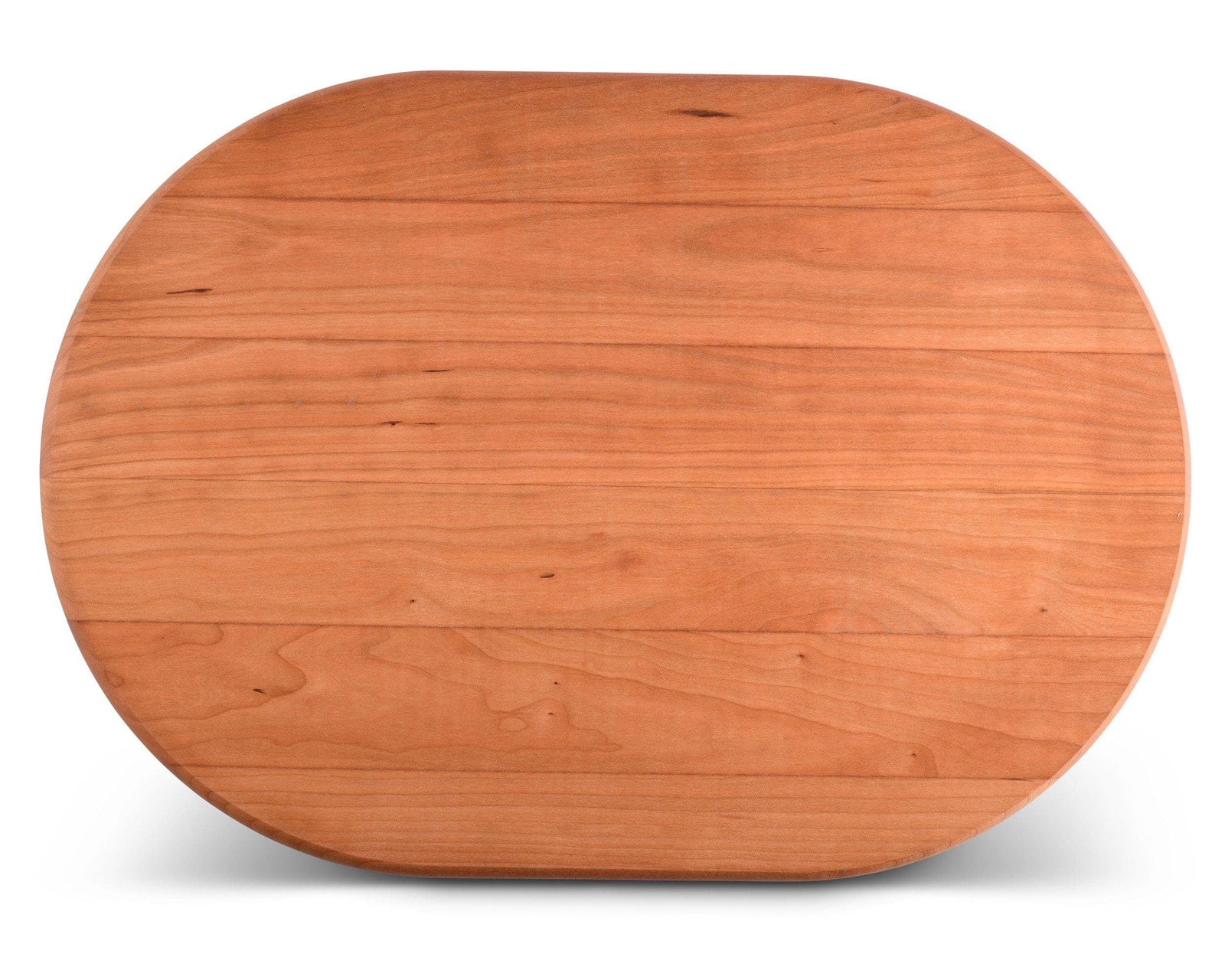 A premium carving board made of rich wood viewed from above, highlighting its artisanal craftsmanship and modern classic design.