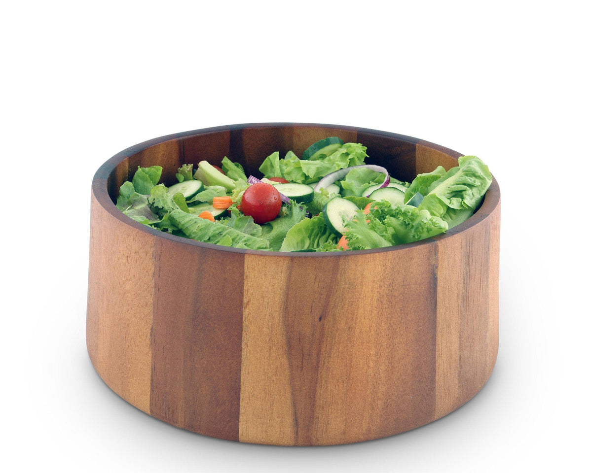 A wooden salad bowl viewed from the side, overflowing with fresh greens and vibrant vegetables, ideal for modern classic table settings.