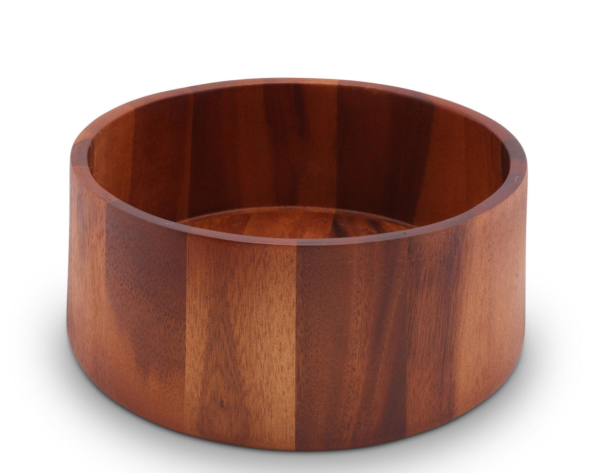 A wooden salad bowl, viewed from a slightly elevated angle, showcasing its artisanal craftsmanship and premium material.
